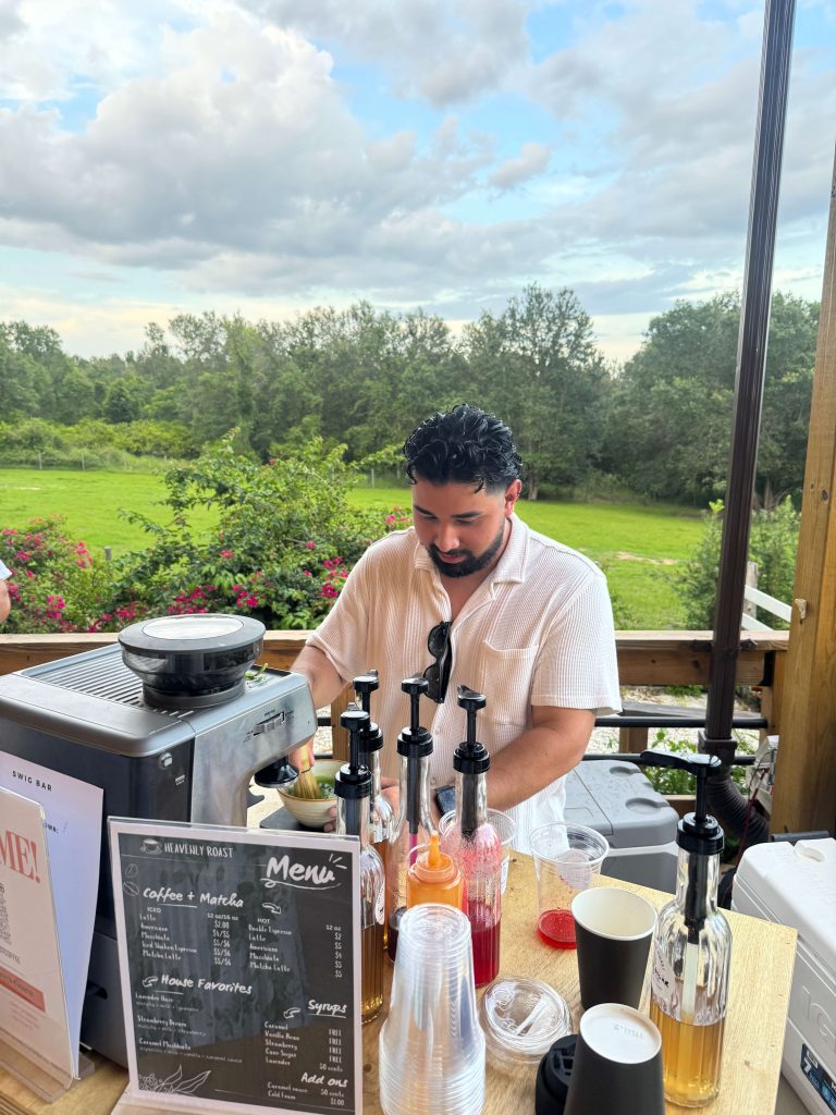 Heavenly Roast barista crafting drinks at an outdoor event