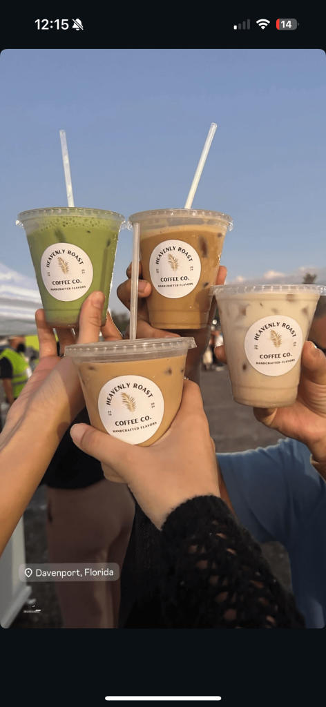 Friends cheersing with Heavenly Roast drinks at Davenport Florida