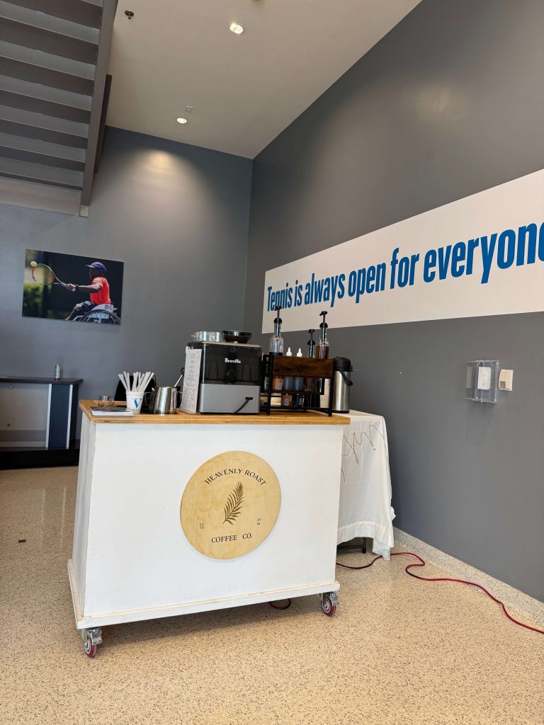 Heavenly Roast coffee cart at a corporate tennis facility event